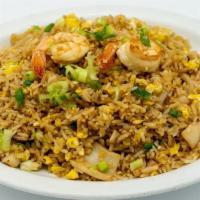 Arroz Chaufa De Mariscos · Seafood combination fried rice with Chinese onions and eggs.