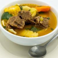 Sopa De Res · Beef rib soup with cabbage, carrot, cassava, corn and seasoning.