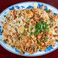 Vegetable Biryani · Mixed vegetable with basmati rice and traditional spices.