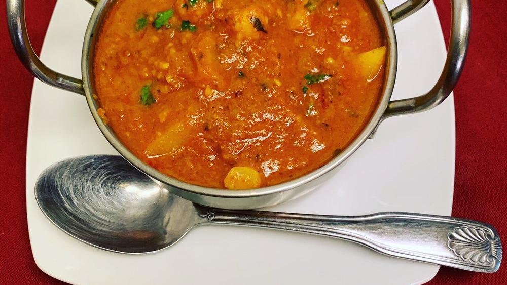 Vegetable Vindaloo · Fresh mix vegetable cooked with potatoes in a spiced and vinaigrette sauce.