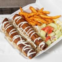 Chicken Kofta Kabab Over Rice Platter · Two Minced Chicken Kababs Over Seasoned Rice Served With, House salad,& Seasoned Fries. Try ...
