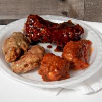 Buffalo Wings · Traditional  Wings With Creamy Buffalo Sauce. Mix Of Flats & Drums. Served With Optional Ran...