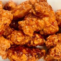 Boneless Wings · one half  lb. of boneless wings tossed in  our buffalo wing sauce and served with ranch