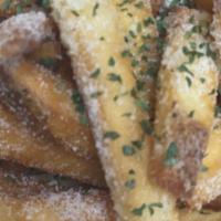 Truffle Fries · Crispy fries tossed with truffle oil and parmesan cheese.