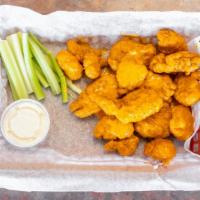 Boneless Buffalo Wings · Served with celery and blue cheese on the side.