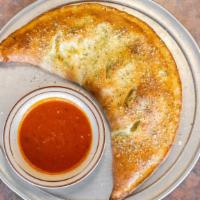 Cheese Calzone · Served with sauce on the side.