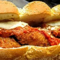 Chicken Cutlet Parmigiano Sandwich · A Bob's classic favorite.  Tender chicken cutlets topped with tomato sauce, Provolone and Ro...