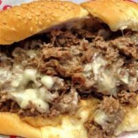 Steak & Cheese Sandwich · Our house classic shaved steak on the grill with melted american cheese.