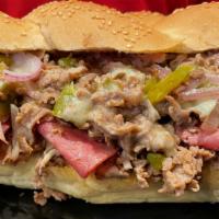 Steak & Cheese Bomb Sandwich · Our house shaved steak with peppers, mushrooms, onions and topped with salami and cheese. No...