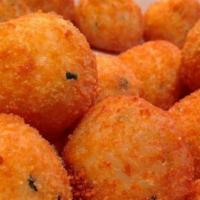 10 Pieces Arancini Bites · Stuffed with fontina cheese or sausage and red pepper combo. Marinara sauce on the side.