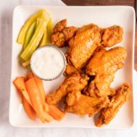 Cp Chicken Wings · CP Chicken wings come in a spicy hot marinade, 8 wings are served with homemade bleu cheese ...