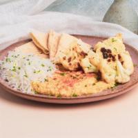 Hummus Cauliflower Plate · Hummus with charred cauliflower and chopped parsley, drizzled with olive oil and topped with...