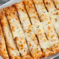 Cheezy Breadsticks · Our breadsticks topped with a blend of melted cheeses, oregano, garlic and butter, served wi...