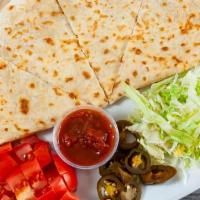 Chicken Quesadilla · Served with salsa, sour cream, lettuce, fresh tomatoes and jalapenos.