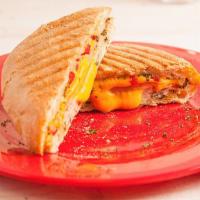 P4 · Turkey breast, pepper jack cheese, roasted red pepper, sun-dried tomatoes and honey mustard.