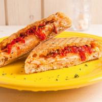 P2 · Ham, turkey breast, cheddar cheese and sun-dried tomato pesto.