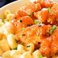 Buffalo Mac N Cheese · Large Portion of Mac N cheese topped with fried chicken with mild sauce, drizzled with blue ...