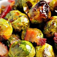 Honey Glazed Brussel Sprouts · Quarter cut brussels sprouts flashed fried in bacon juice, tossed with a sweet n spicy honey...