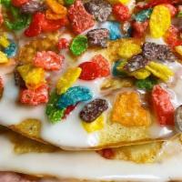Fruity Pebbles Pancakes Platter · Our classic pancakes filled with fruity pebbles, layered with strawberry cream cheese, and t...