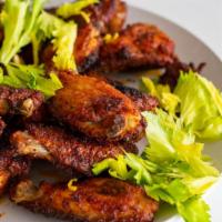 Mambo Bbq Wings · Deep fried chicken wings tossed in the popular spicy sweet Mambo sauce. Comes with your choi...