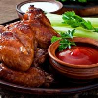 Bbq Wings  · Deep fried chicken wings tossed in a BBQ sauce. Comes with your choice of dipping sauce.