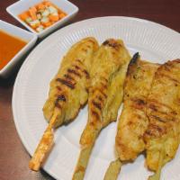 Chicken Satay · 4 pieces. Grilled chicken on skewers marinated in special sauce. Served with peanut sauce an...