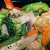 Broccoli · Broccoli, carrot, and mushroom in oyster sauce. Served with rice.