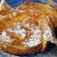 Croissant French Toast · Topped with butter and cinnamon sugar.