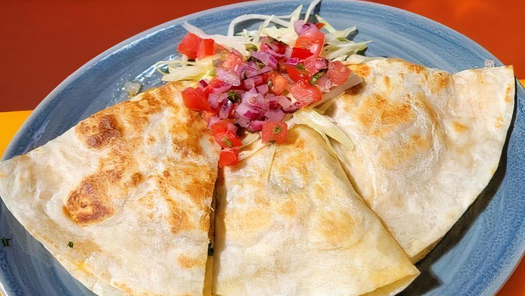 Cheese Quesadilla (V) · Toasted flour tortilla with melted cheese, onions, pickled jalapeños. Served with shredded lettuce, pico de gallo, and house made crema.