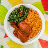 Jollof Rice With Spinach And Plantains · Jollof rice served with deep fried chicken with spinach slow-cooked in low heat and plantains.
