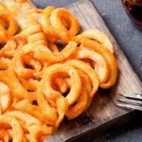 Curly Fries · Perfectly seasoned golden curly fries.