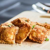 Fried Ravioli (6 Pieces) · Ravioli stuffed with ricotta, romano, mozzarella and asiago cheese and fried to golden perfe...