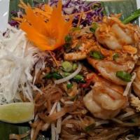 Pad Thai Shrimp · Traditional pan-fried thin rice noodles, tofu, chives, bean sprouts, preserved radish, dried...