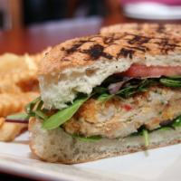 Crabcake · Mayonnaise, lettuce, and tomatoes on brioche. Served with Tutti Tuscan fries.