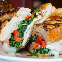 Chicken & Broccoli Rabe · Roasted Pepper and sharp provolone on an Italian roll. Served with Tutti Tuscan fries.