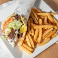 Gyro · Greek-Style Sandwich of Shaved Meat, Lettuce, Tomatoes,Onions, Pickles, on Gyro Pita Bread
