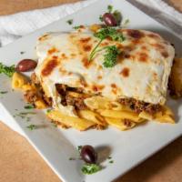 Pastitsio · Traditional Greek Pasta Dish with Layers of
Ground Beef, Homemade Greek Tomato
Sauce, Penne,...