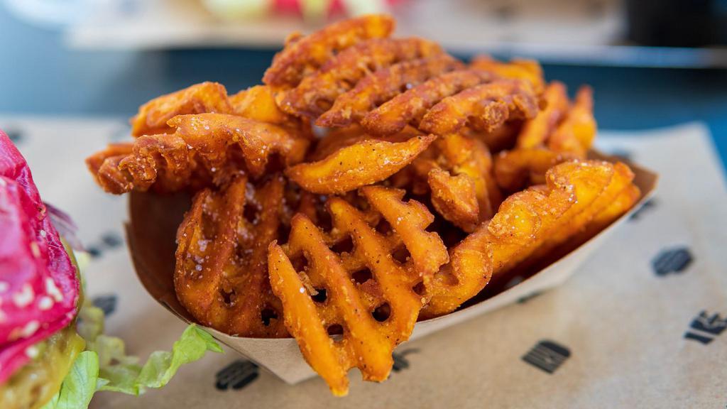 Spicy Potato Waffle Fries · Crispy waffle fries with our house spicy seasonings.