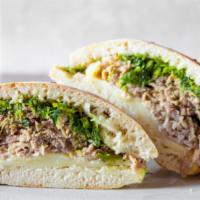 Gourmet Roast Pork Sandwich · Served with broccoli rabe, and sharp provolone cheese.