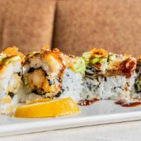J54: Dragon Roll · Tempura roll topped with eel, avocado, and tobiko.