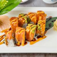 Ichiban Roll · Salmon, tempura, cream cheese with smoked salmon and avocado on top..