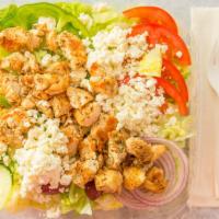 Chicken Kabob Greek Salad · Marinated grilled chicken on a Greek salad with Greek dressing.