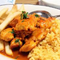 Mozambique Chicken · Served with choice of Rice, Fries or Fresh salad.