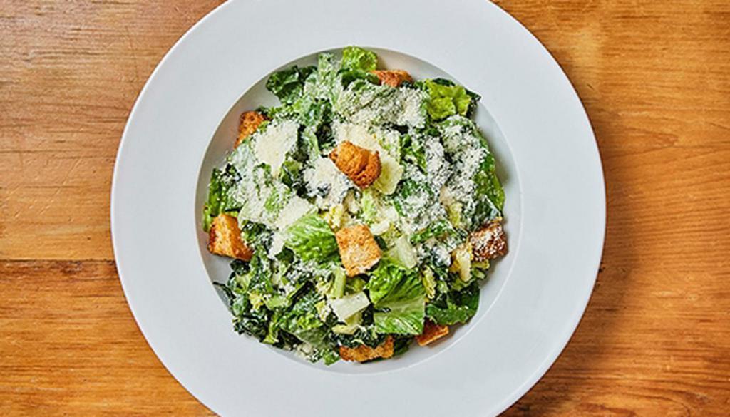 Caesar Salad · Romaine, kale, croutons and parmesan cheese tossed in creamy Caesar dressing