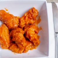 Jumbo Buffalo Wings · served with blue cheese or ranch, sauce choice.