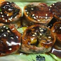 Beef Negimaki · Scallion rolled in thinly sliced rib eye, served wth teriyaki sauce.