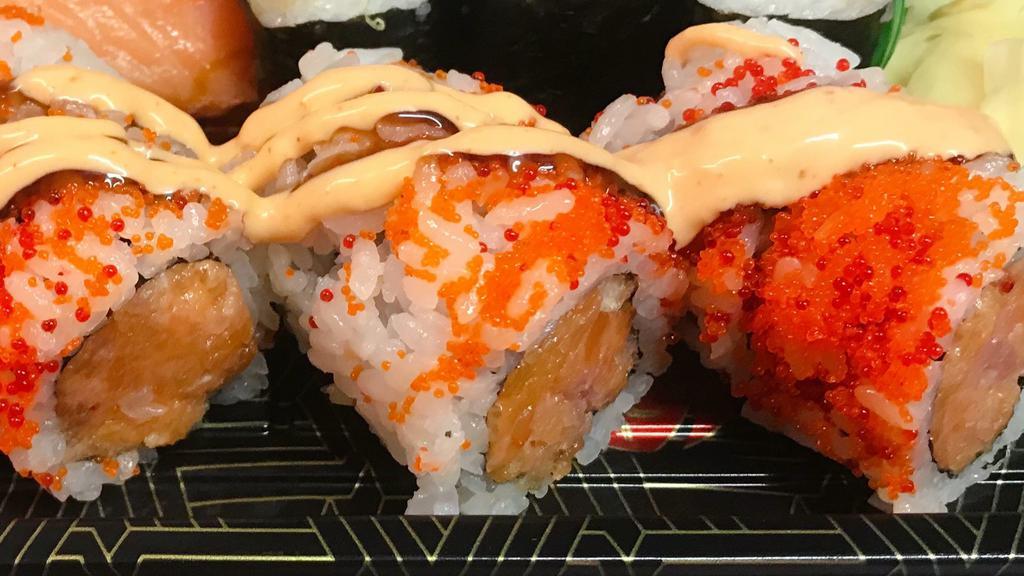 Spicy Girl Roll  · (In)spicy salmon, spicy tuna, spicy white tuna
(out)masago, spicy mayo & eel sauce