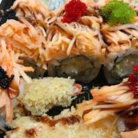 Fire Phoenix Roll  · (in) shrimp tempura 
(out) spicy crunchy crab and three different tobiko in chef’s special s...