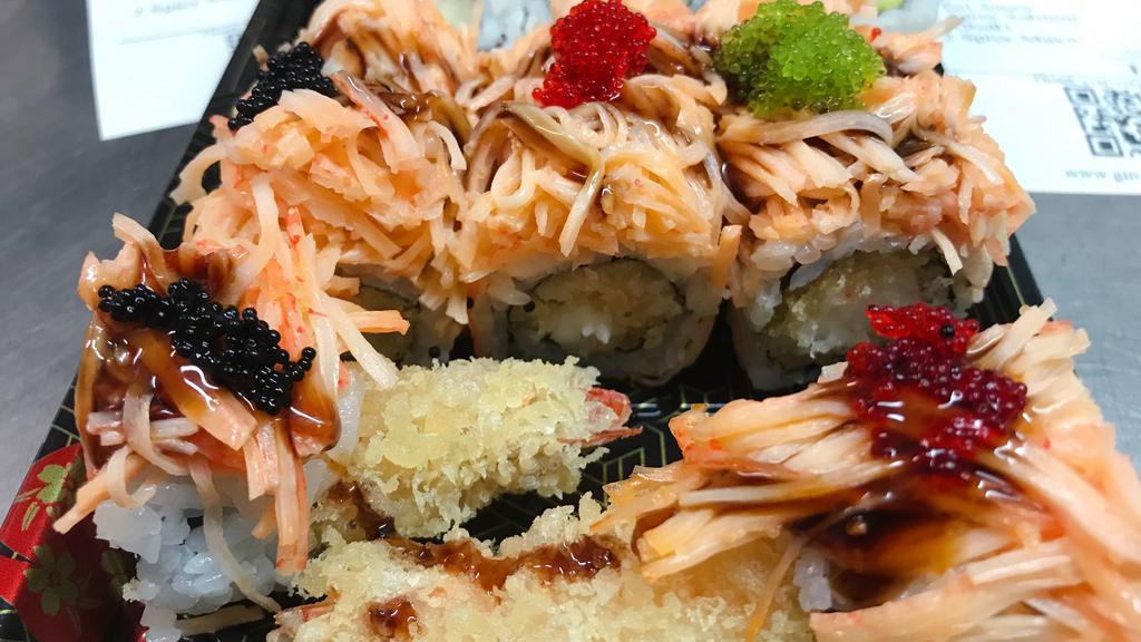 Fire Phoenix Roll  · (in) shrimp tempura 
(out) spicy crunchy crab and three different tobiko in chef’s special sauce