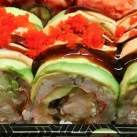 Tokyo Roll · (in) shrimp tempura,crab stick , eel and pink soy paper 
(out) avocado, masago and eel sauce